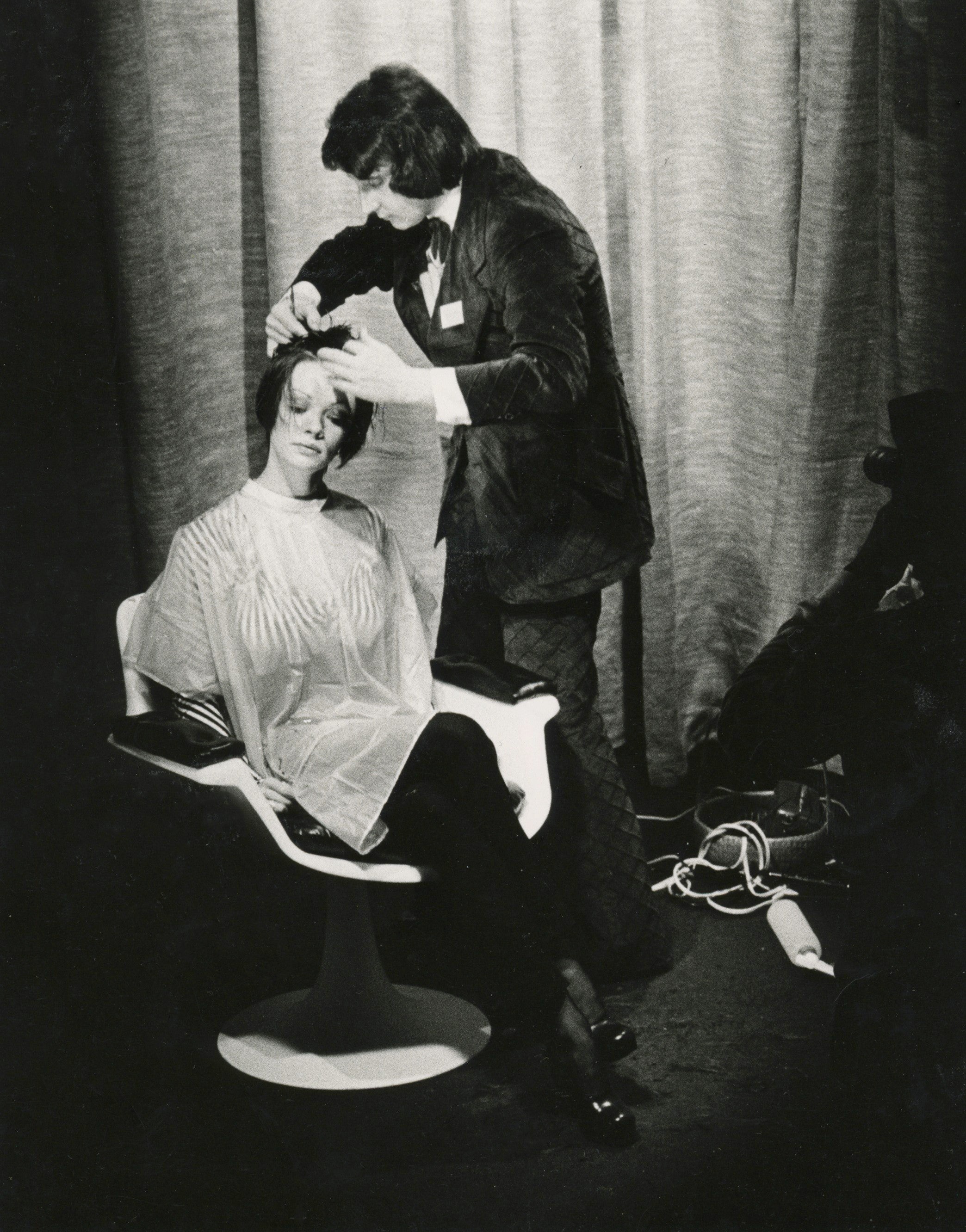 Founder Horst Rechelbacher in 1960's cutting women's hair short